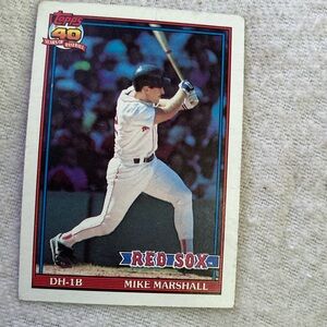 One baseball cars like new in plastic